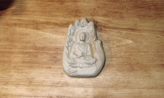 Boudha dans une main