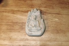 Boudha dans une main